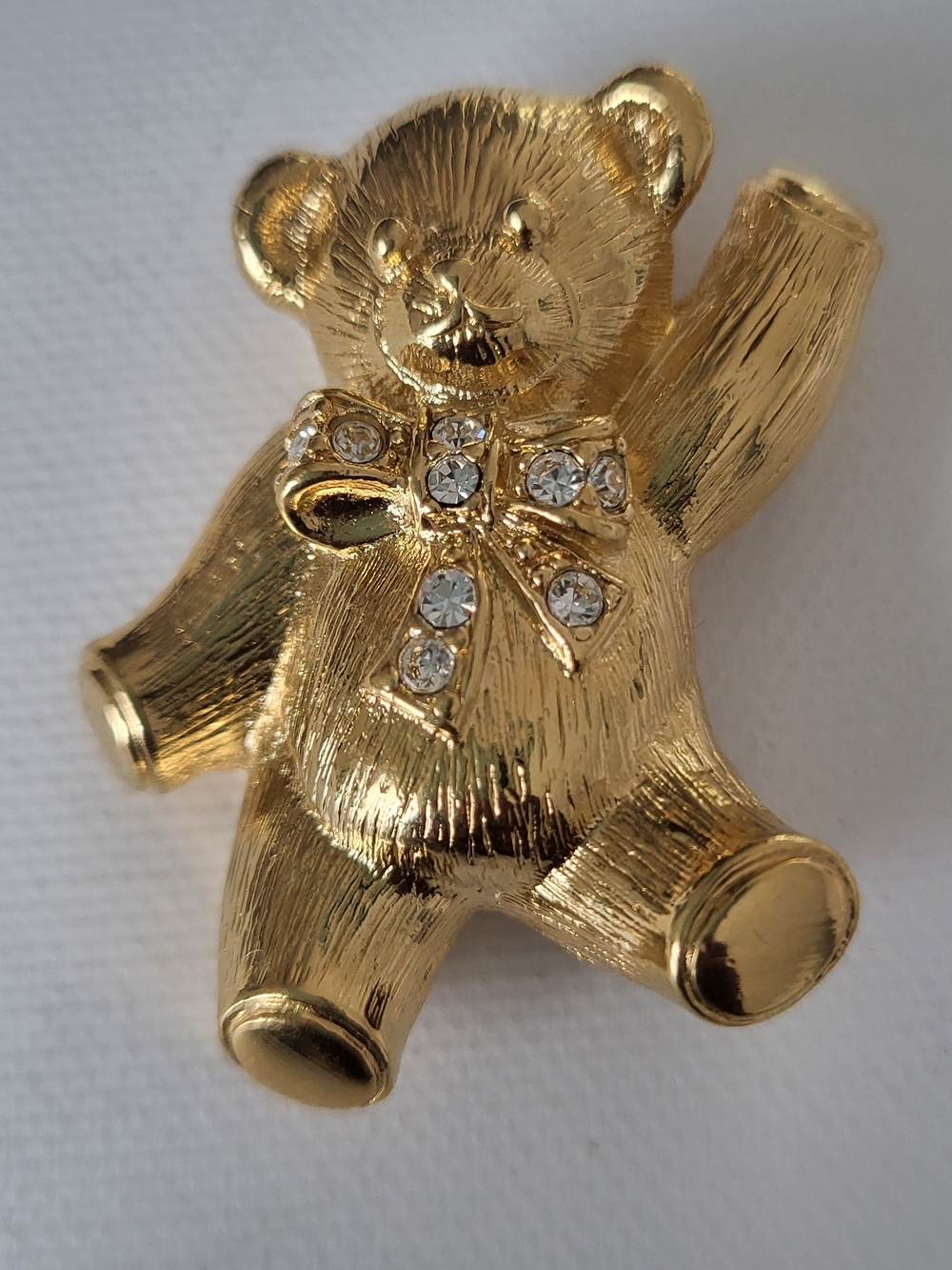 Vintage Avon Gold Toned Teddy Bear Brooch with Rhinestone Bow